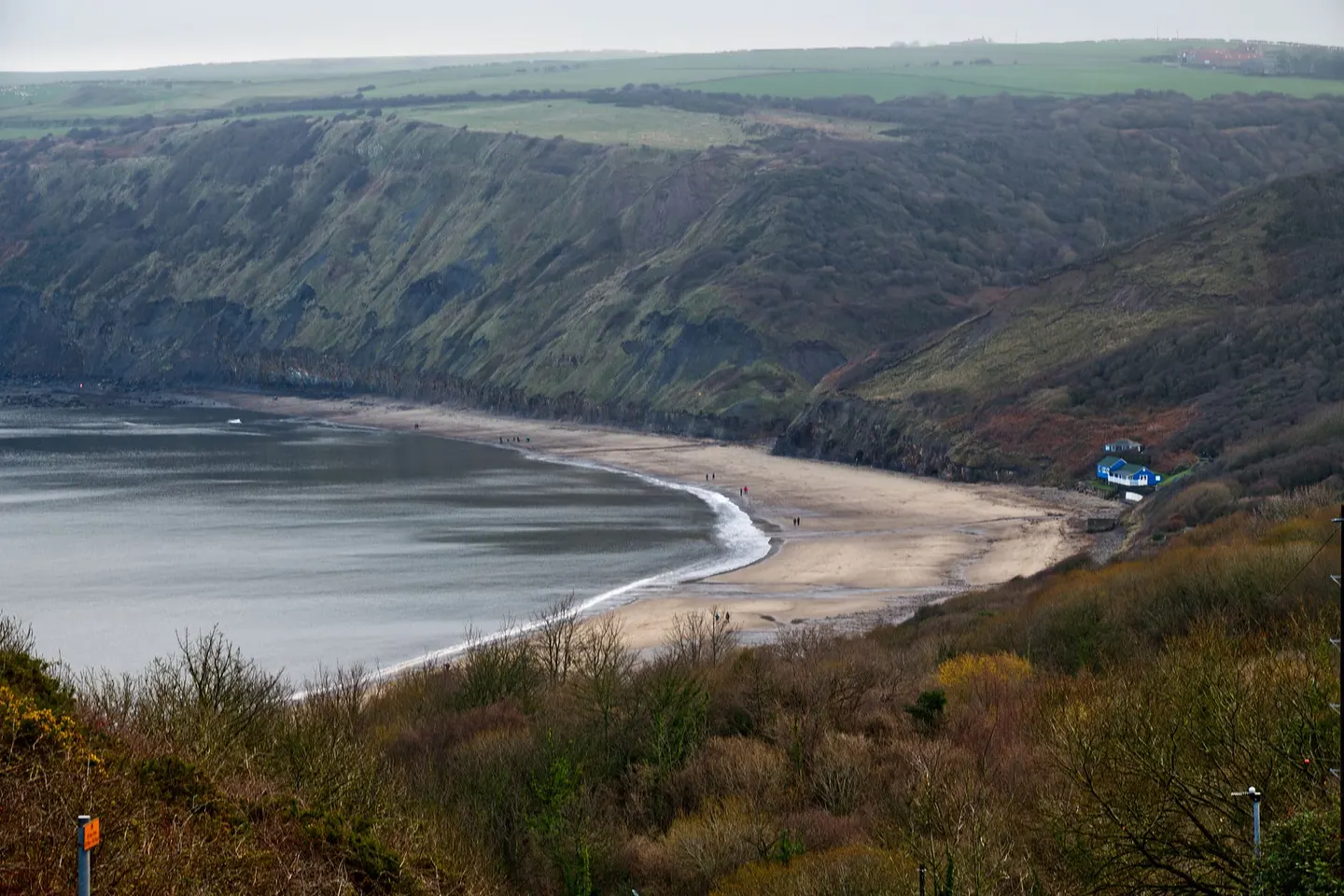 Photo of Runswick Bay, a swimming spot near Staithes in the North York Moors, North Yorkshire, northern England.