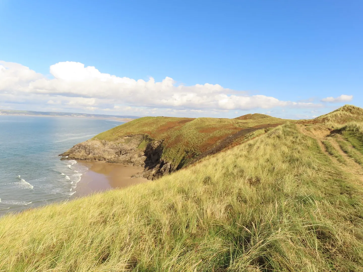 Photo of Blue Pool Bay, a cove near Llangennith in Gower, Swansea, south west Wales.
