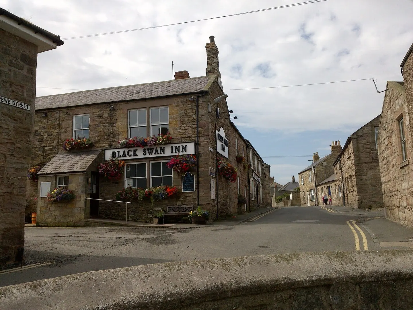 Photo of The Black Swan Inn, a pub near Seahouses, Northumberland, north east England.