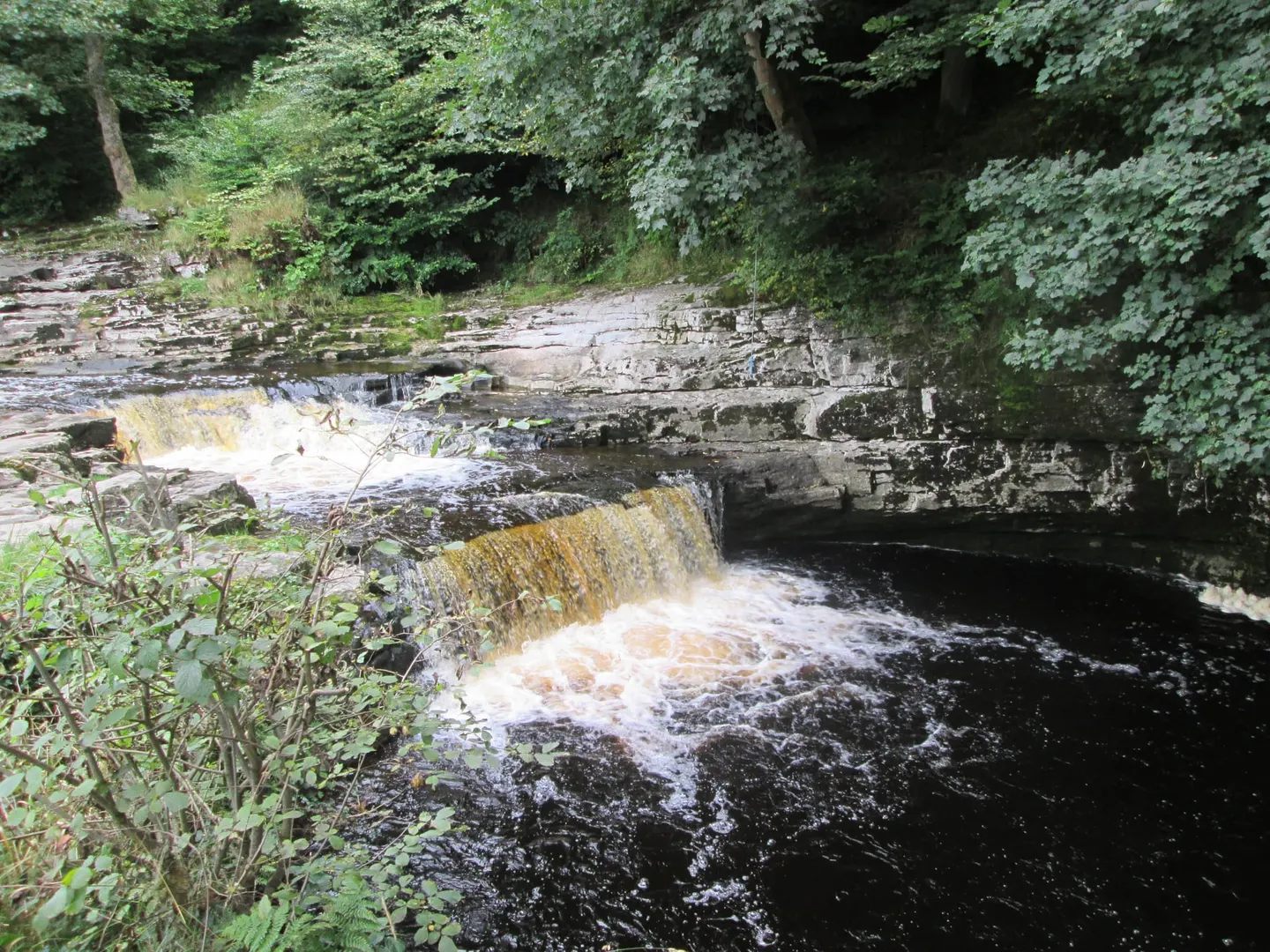 Photo of Stainforth Force, a waterfall in the Yorkshire Dales, North Yorkshire, northern England.