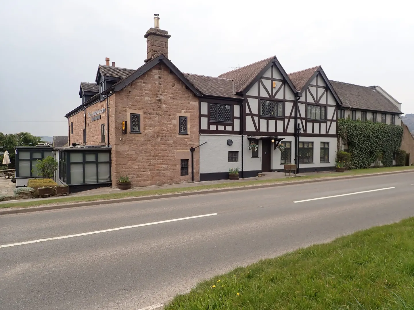 Photo of Three Horseshoes Inn, a pub near Blackshaw Moor in the Peak District, Staffordshire, central England.