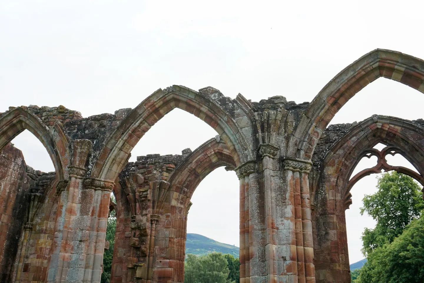 Photo of Melrose Abbey, a ruined abbey in Eildon and Leaderfoot, the Scottish Borders, southern Scotland.