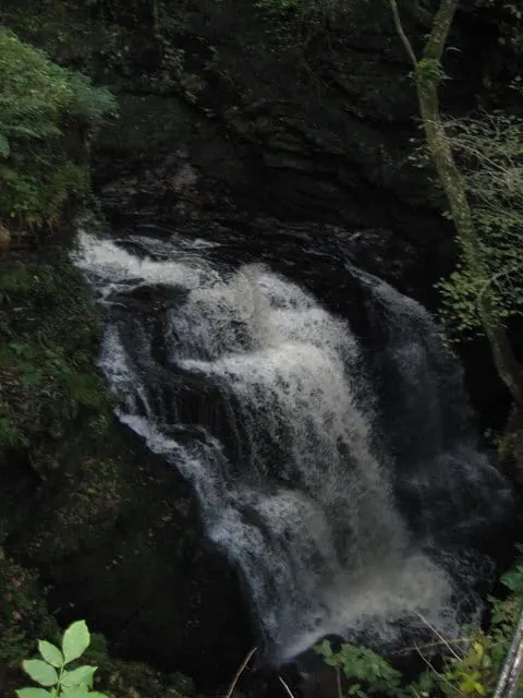 Photo of Rhaeadr Cynfal, a waterfall near Maentwrog in Eryri, Gwynedd, north Wales.
