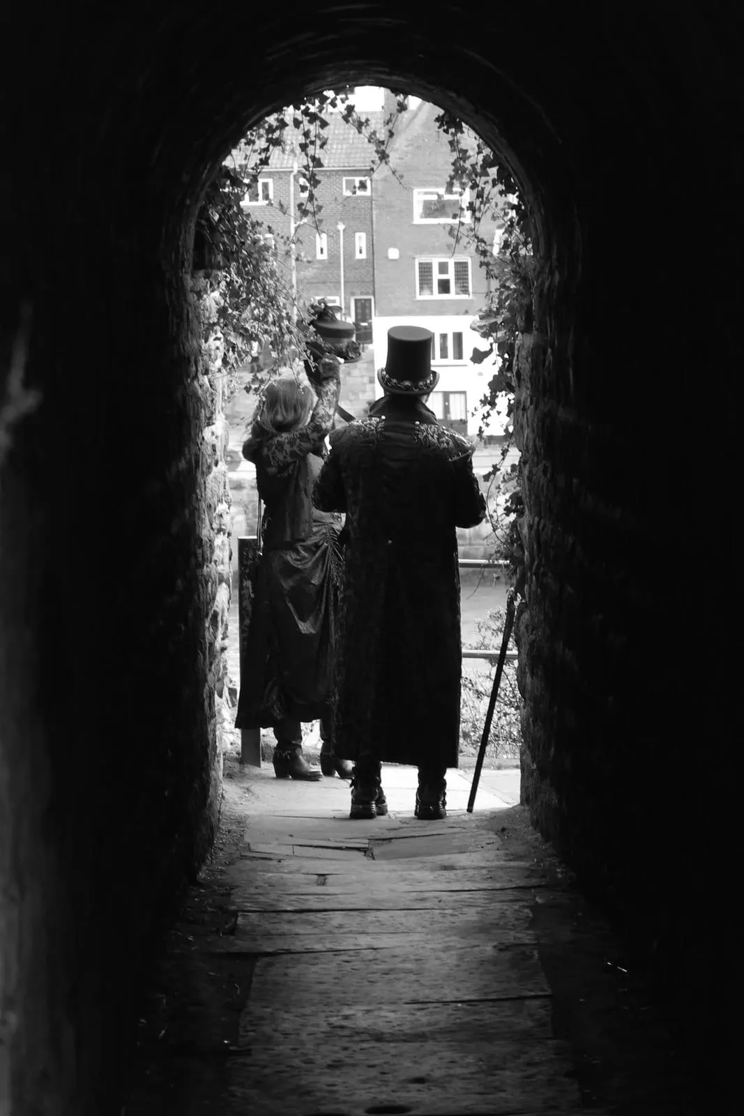 Photo of Screaming Tunnel, North Yorkshire — Visitors in Victorian dress, seen from inside the tunnel.