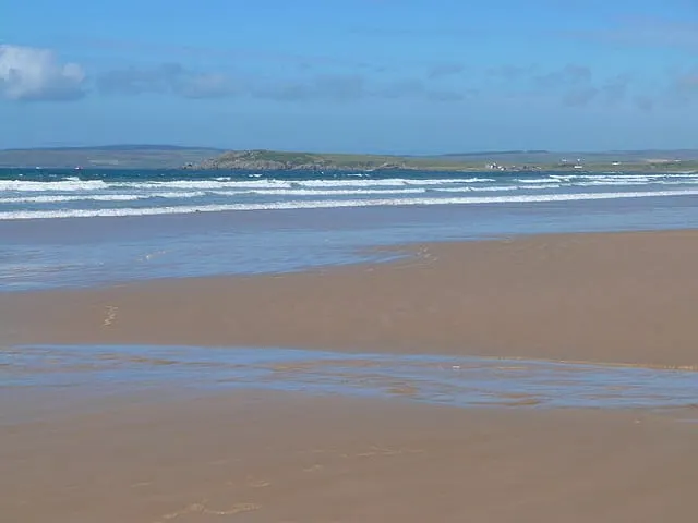 Photo of Laggan Bay, a beach near Bowmore, Argyll and Bute, the Scottish Highlands and Islands.
