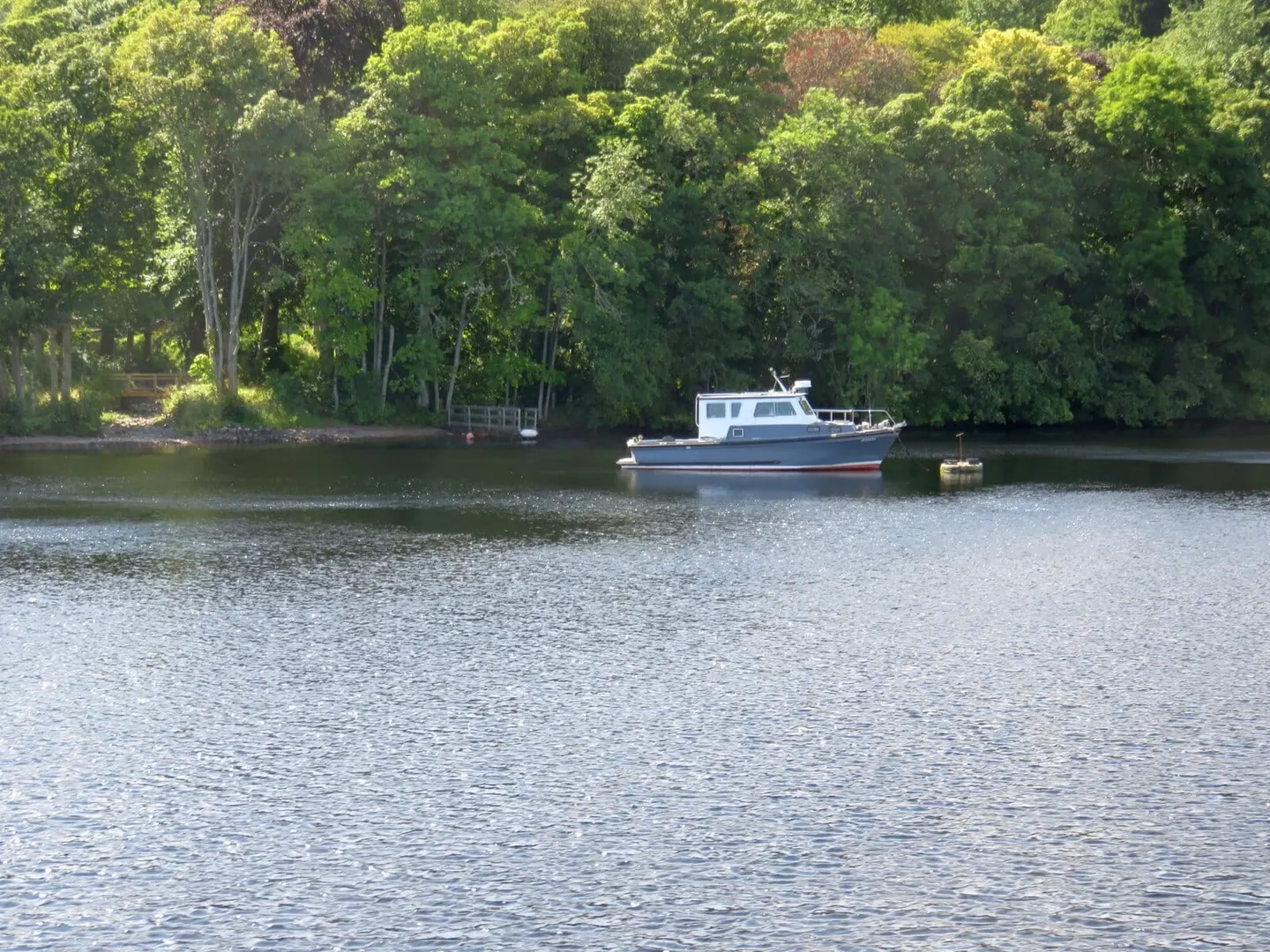 Photo of Loch Dochfour, a loch near Dores, Highland, the Scottish Highlands and Islands.