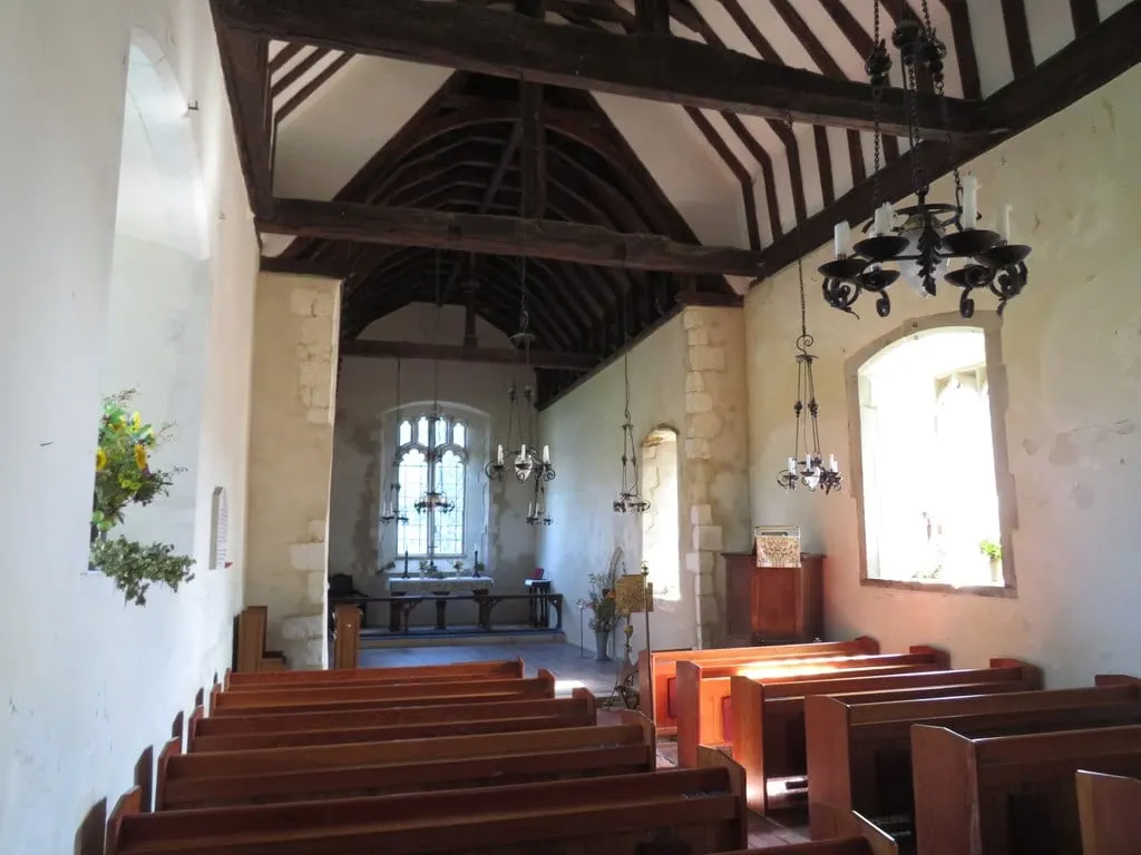 Photo of Alciston Church, a church in the South Downs, East Sussex, south east England.