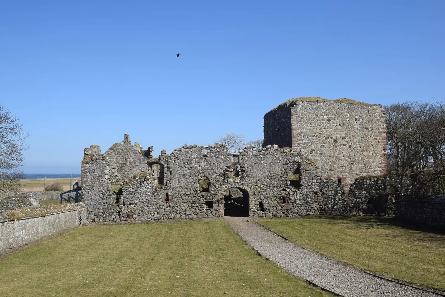 Photo of Pitsligo Castle, a ruined castle near Rosehearty, Aberdeenshire, north east Scotland.