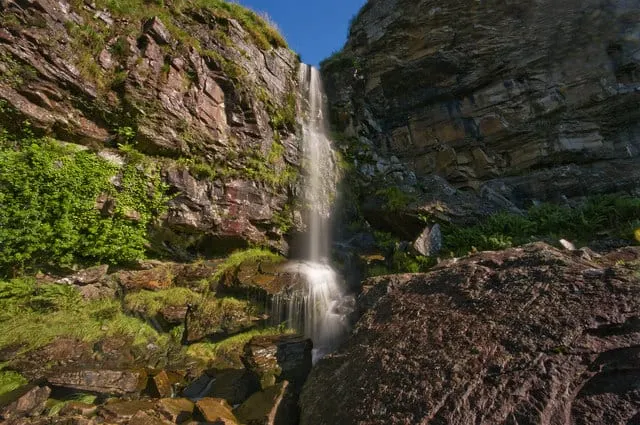 Photo of Penpych Waterfall, a waterfall near Pontneddfechan, Rhondda Cynon Taf, south east Wales.
