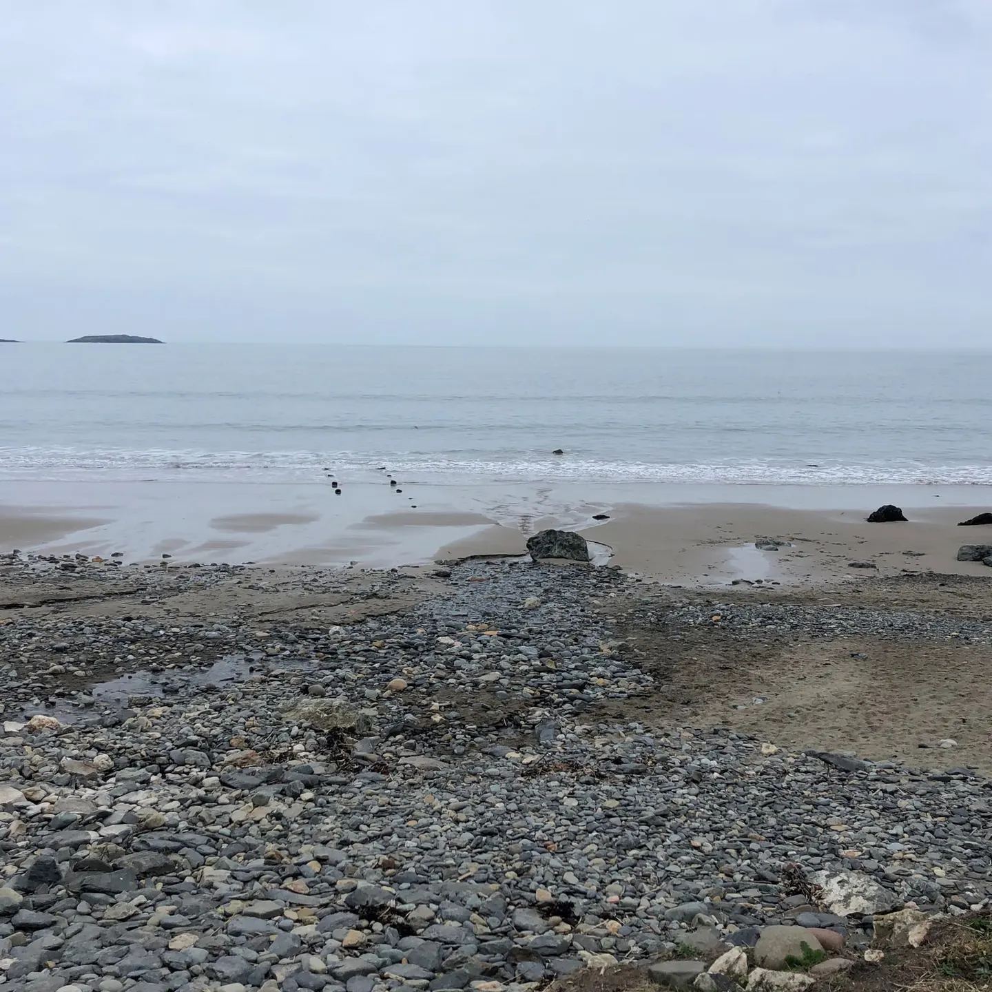 Photo of the coast at Cwrt, Henfaes and Porth Simdde, Gwynedd, north Wales.