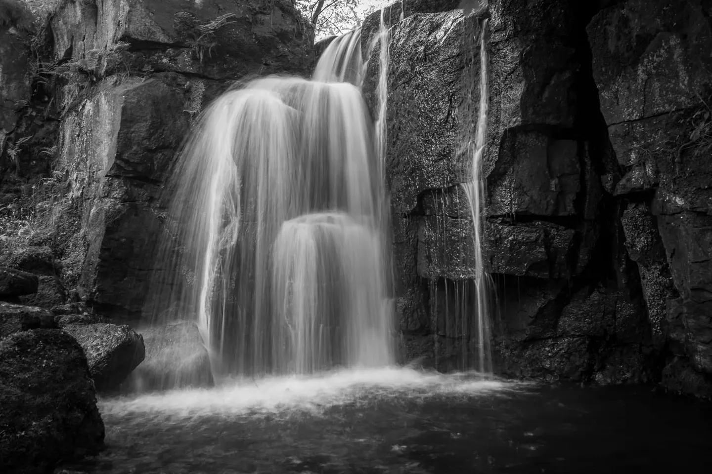 Photo of Lumsdale Falls, a waterfall near Matlock Bath, Derbyshire, central England.