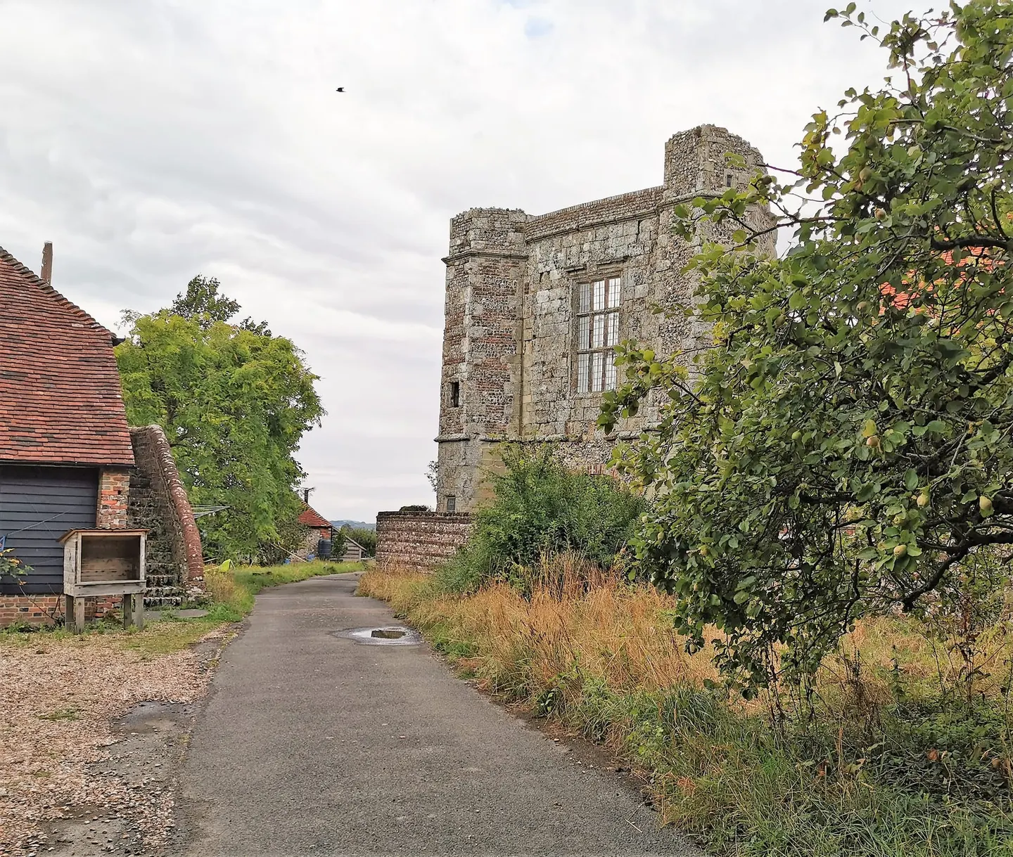 Photo of Wilmington Priory, a ruined priory in the South Downs, East Sussex, south east England.