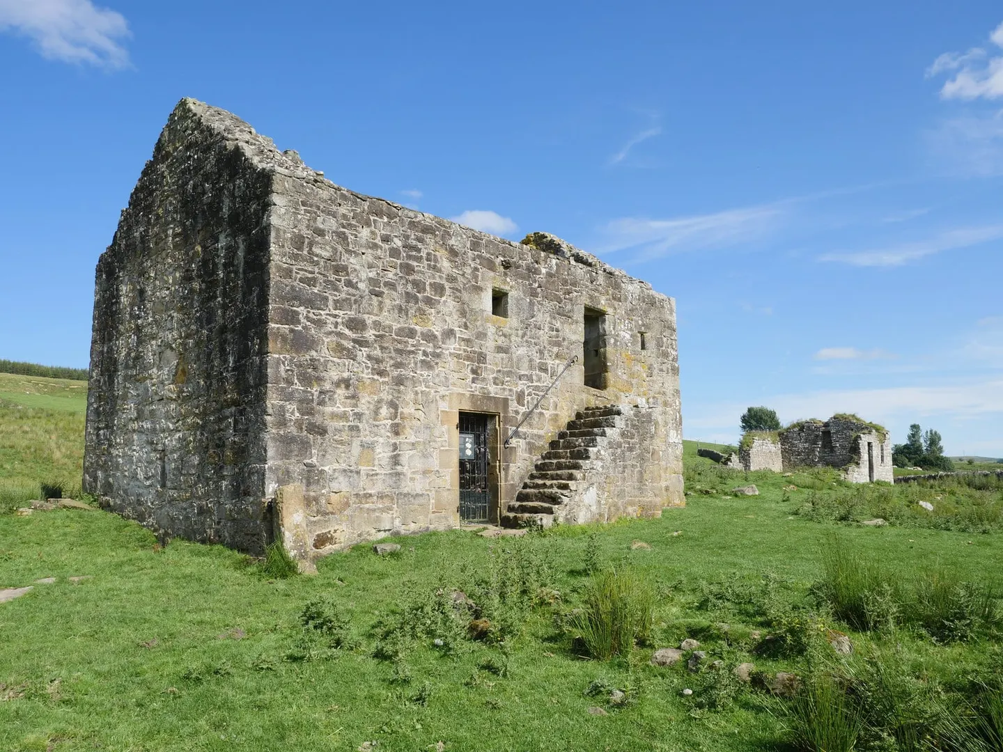 Photo of Black Middens Bastle House, a ruined tower house near Falstone, Northumberland, north east England.