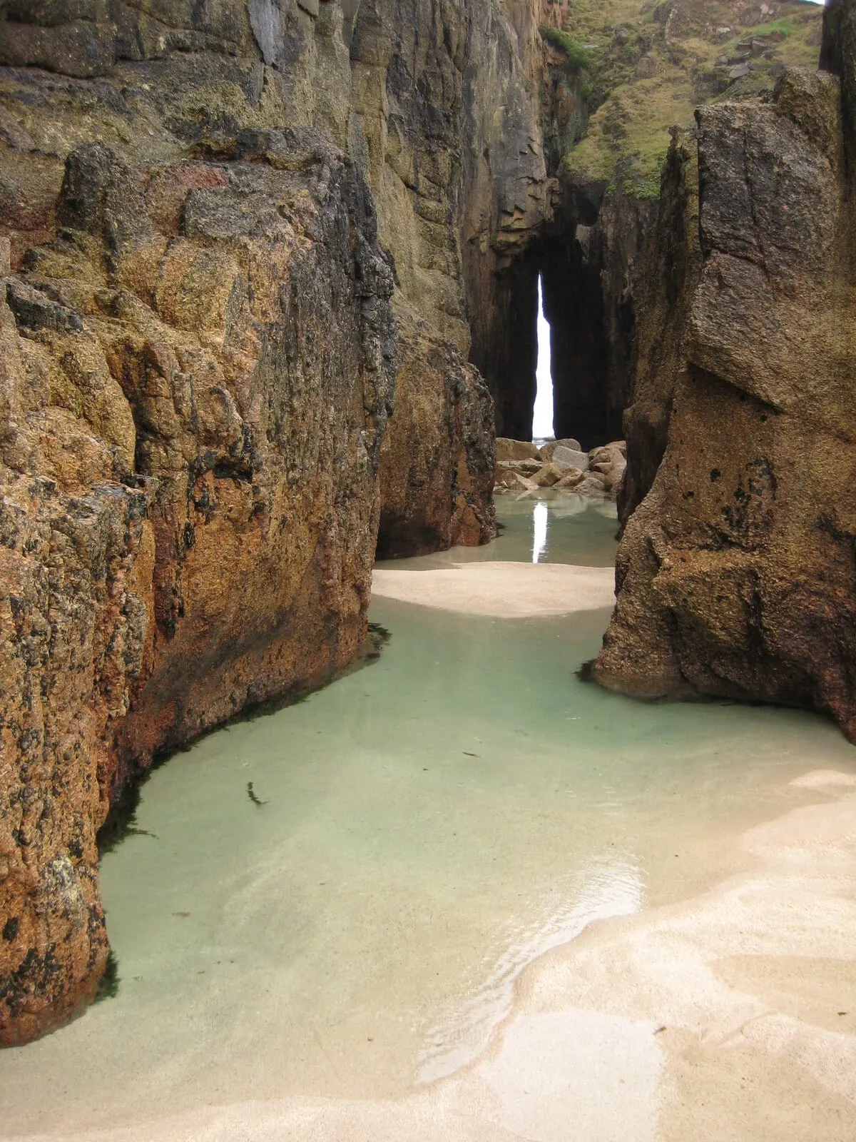 Photo of Nanjizal Beach, a cove near Sennen Cove, Cornwall, south west England.
