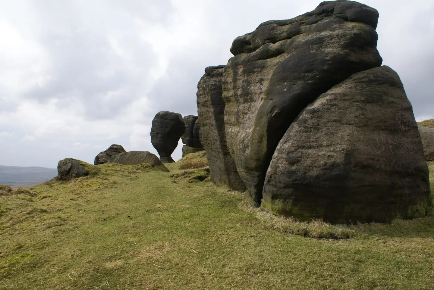Photo of The Bridestones, a rock formation near Levisham in the North York Moors, North Yorkshire, northern England.