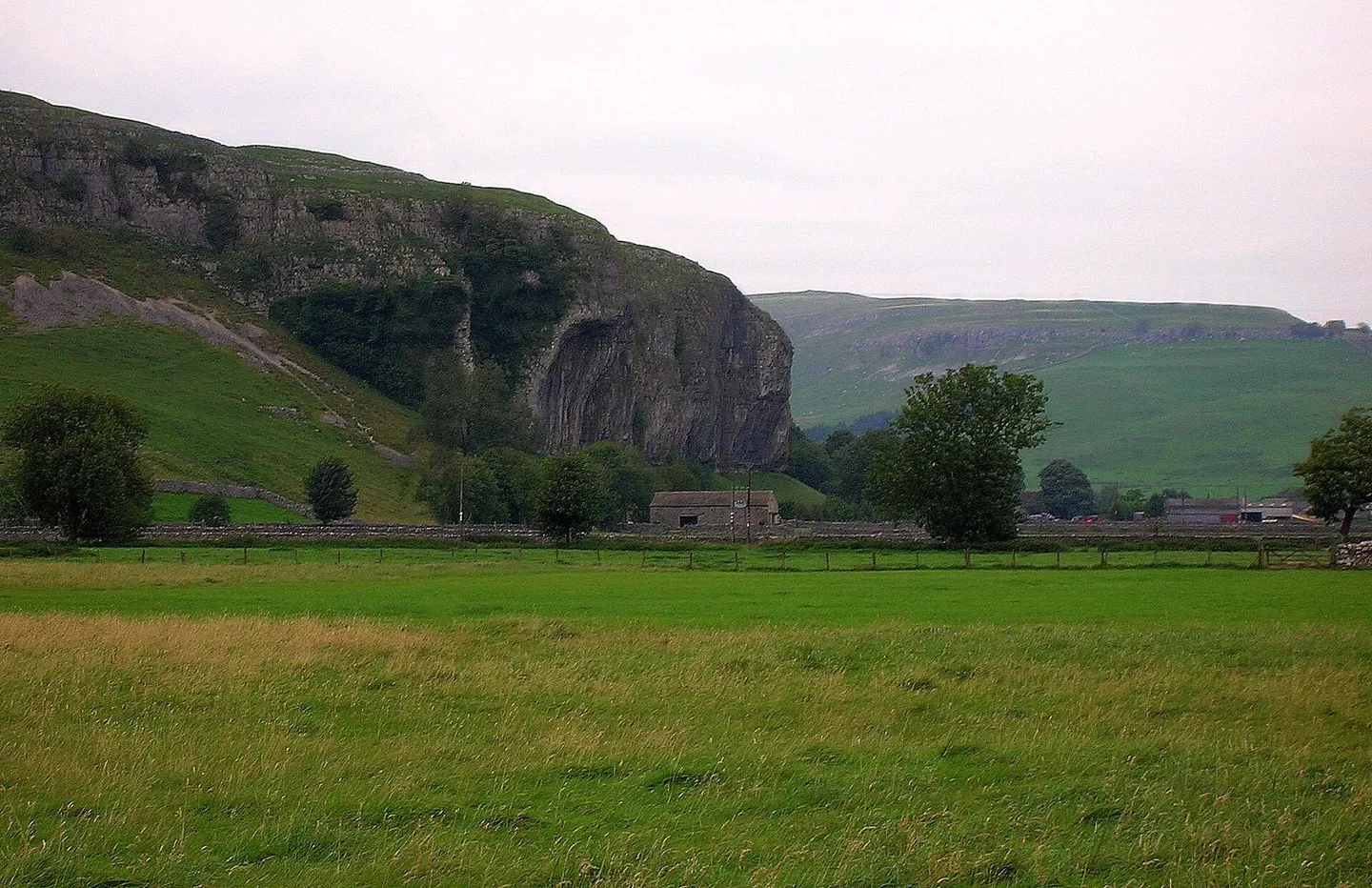 Photo of Kilnsey Crag, a rock formation near Conistone in the Yorkshire Dales, North Yorkshire, northern England.