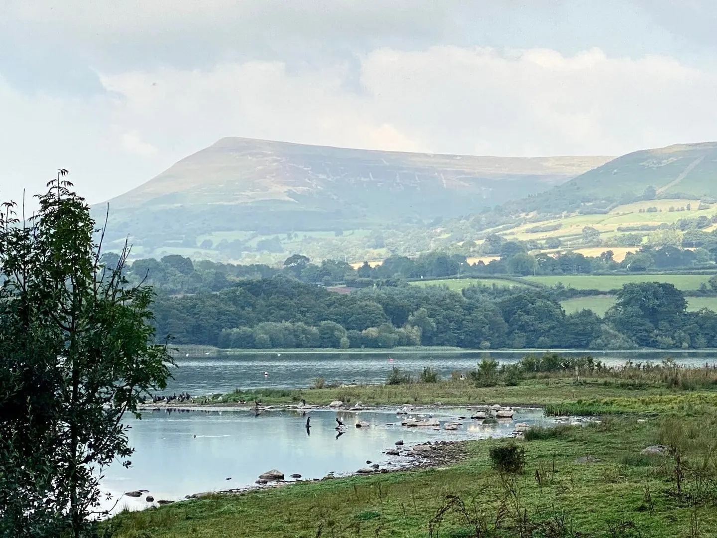 Photo of Llangorse Lake, a Lake near Llangorse (Llan-gors) in Bannau Brycheiniog, the Powys, mid Wales.