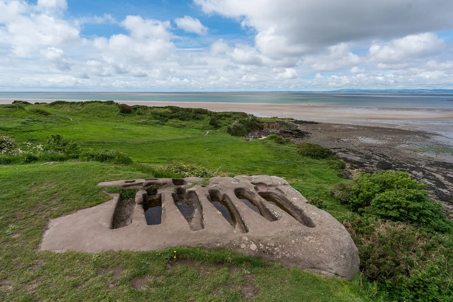 Photo of St Patrick's Chapel & Rock-cut Graves, a ruined chapel near Heysham, Lancashire, north west England.