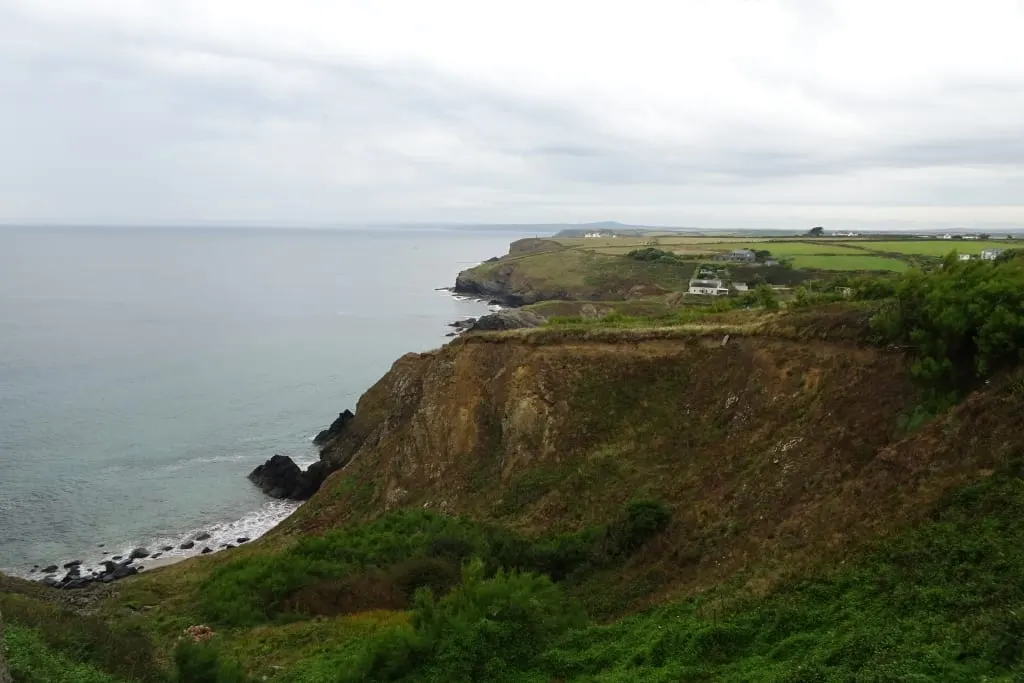 Photo of Polurrian Cove, a swimming spot near Mullion, Cornwall, south west England.