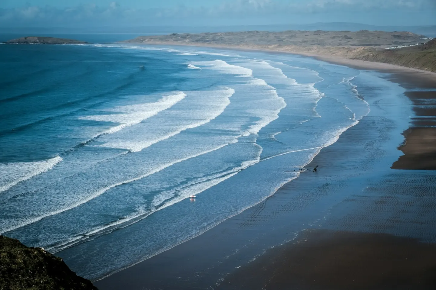 Photo of Rhossili Bay, a beach in Gower, Swansea, south west Wales.