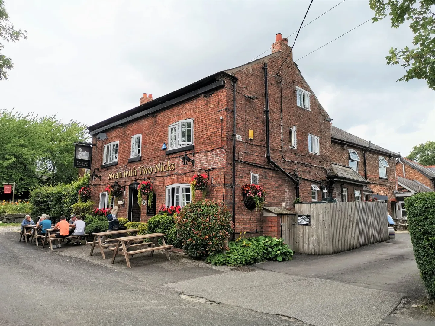 Photo of The Swan with Two Nicks, a pub near Little Bollington, Cheshire, north west England.