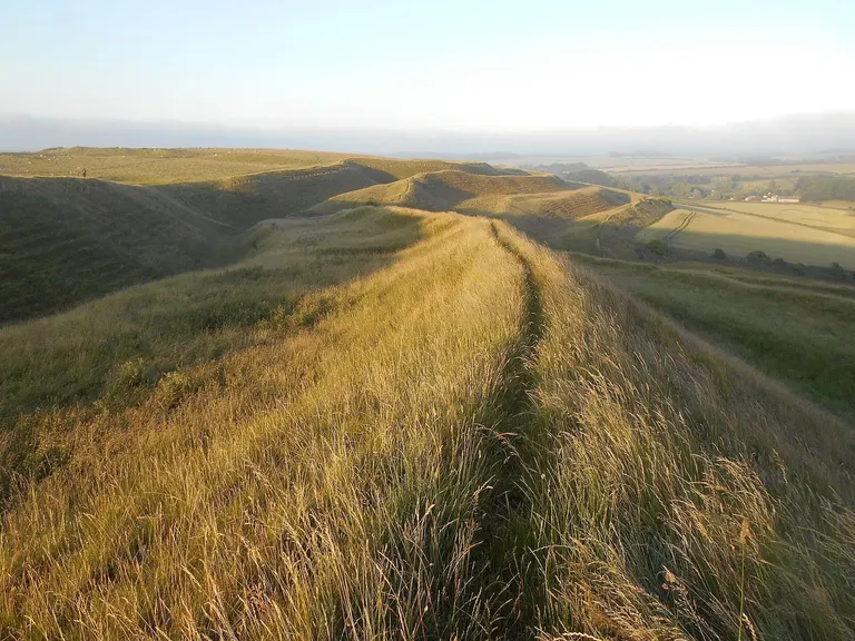 Photo of Maiden Castle, a hillfort near Dorchester, Dorset, south west England.