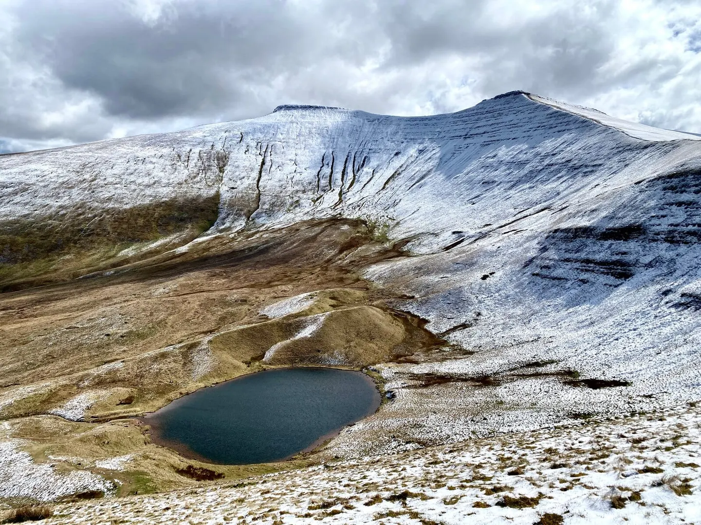 Photo of Llyn Cwm Llwch, a lake near Libanus in Bannau Brycheiniog, the Powys, mid Wales.