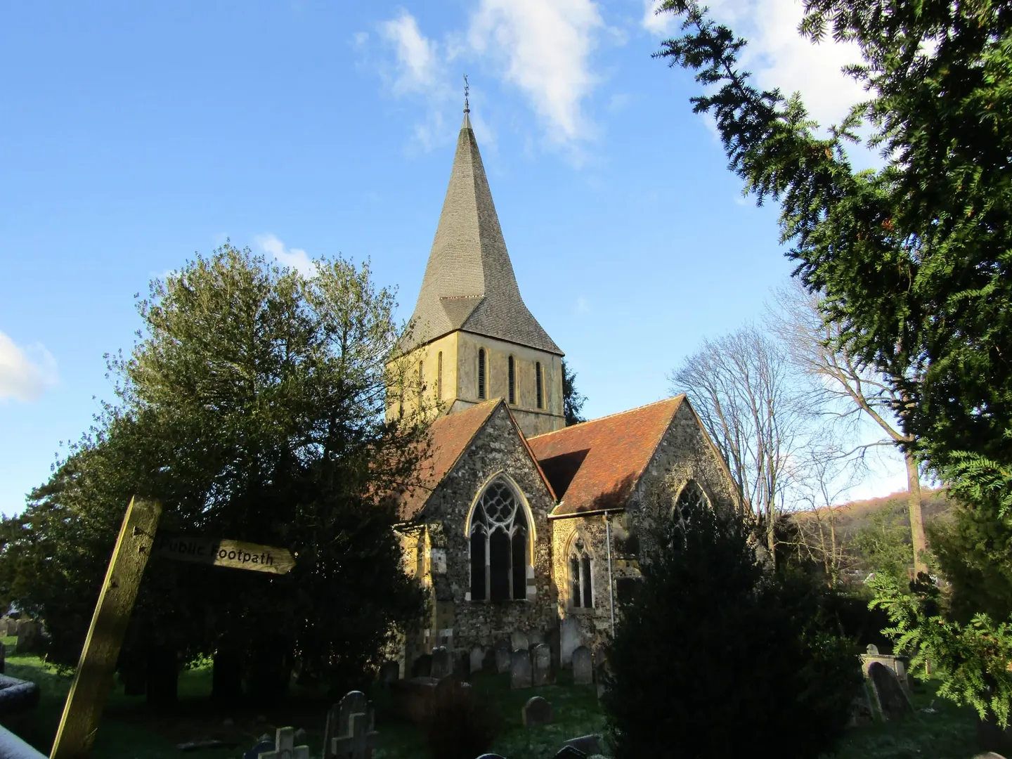 Photo of St James' Church, Shere, a church in Surrey, south east England.