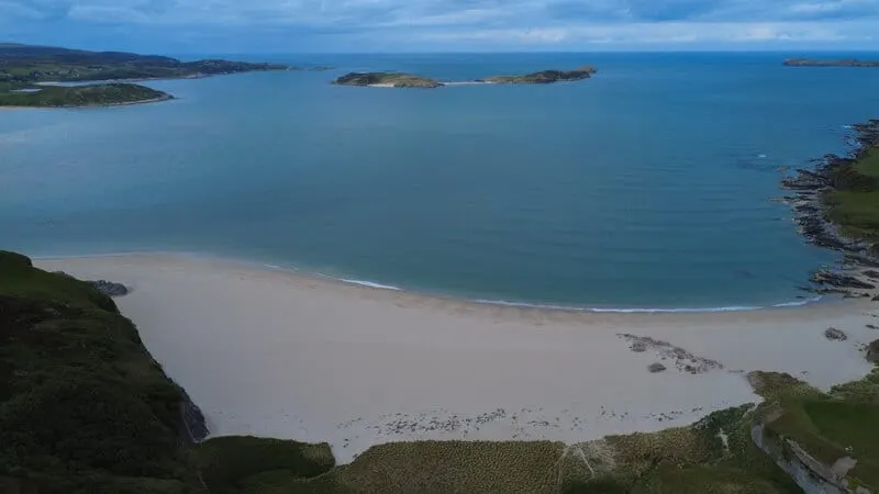 Photo of Coldbackie Beach, a beach near Tongue in the Kyle of Tongue, Highland, the Scottish Highlands and Islands.