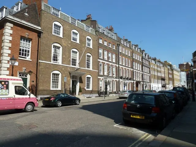 Photo of 40, 42, 44 Queen Anne's Gate, a house & garden in London, England.