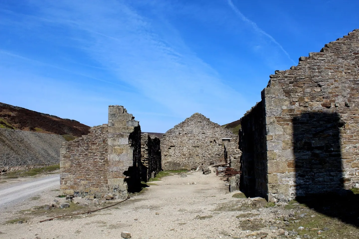 Photo of Old Gang Smelt Mill, North Yorkshire — the roofless mill buildings.