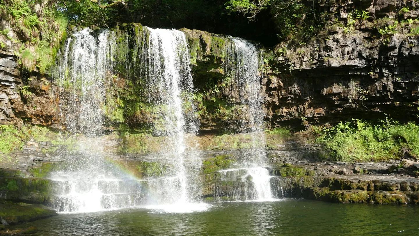 Photo of Sgwd yr Eira, a waterfall near Penderyn in Bannau Brycheiniog, the Powys, mid Wales.