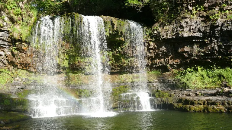 Photo of Sgwd yr Eira, a waterfall near Penderyn in Bannau Brycheiniog, the Powys, mid Wales.