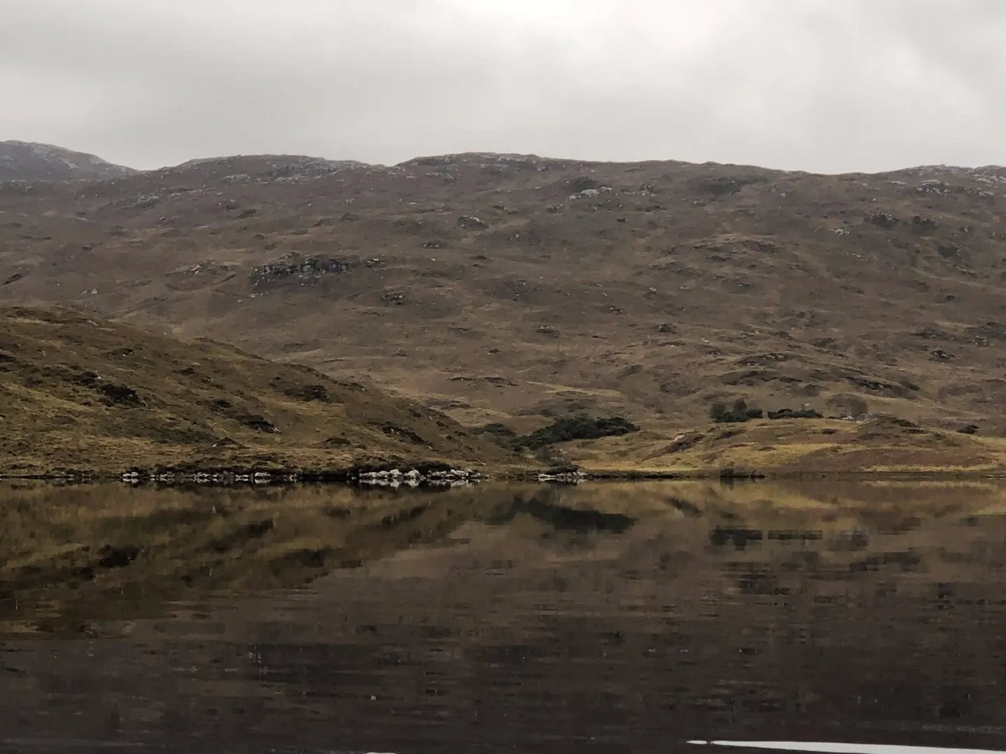 Photo of Loch Assynt, a loch near Unapool in Assynt–Coigach, Highland, the Scottish Highlands and Islands.