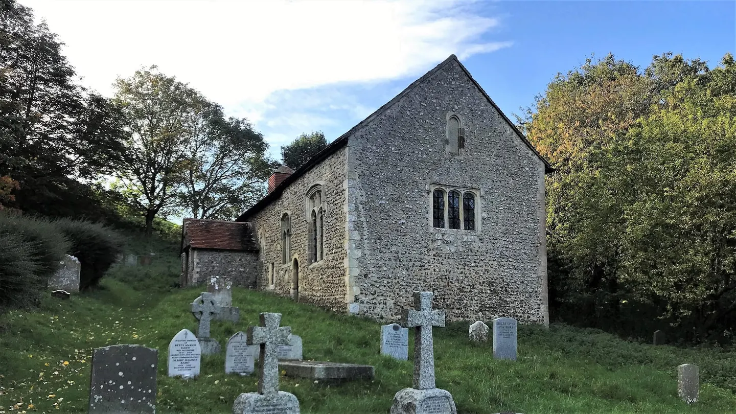 Photo of Coombes Church, a church in the South Downs, West Sussex, south east England.