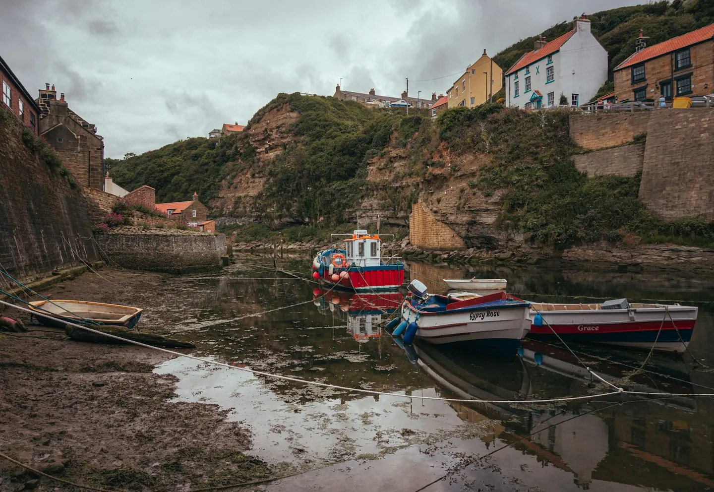 Photo of Staithes, North Yorkshire — Fishing boats moored in the beck at low tide.