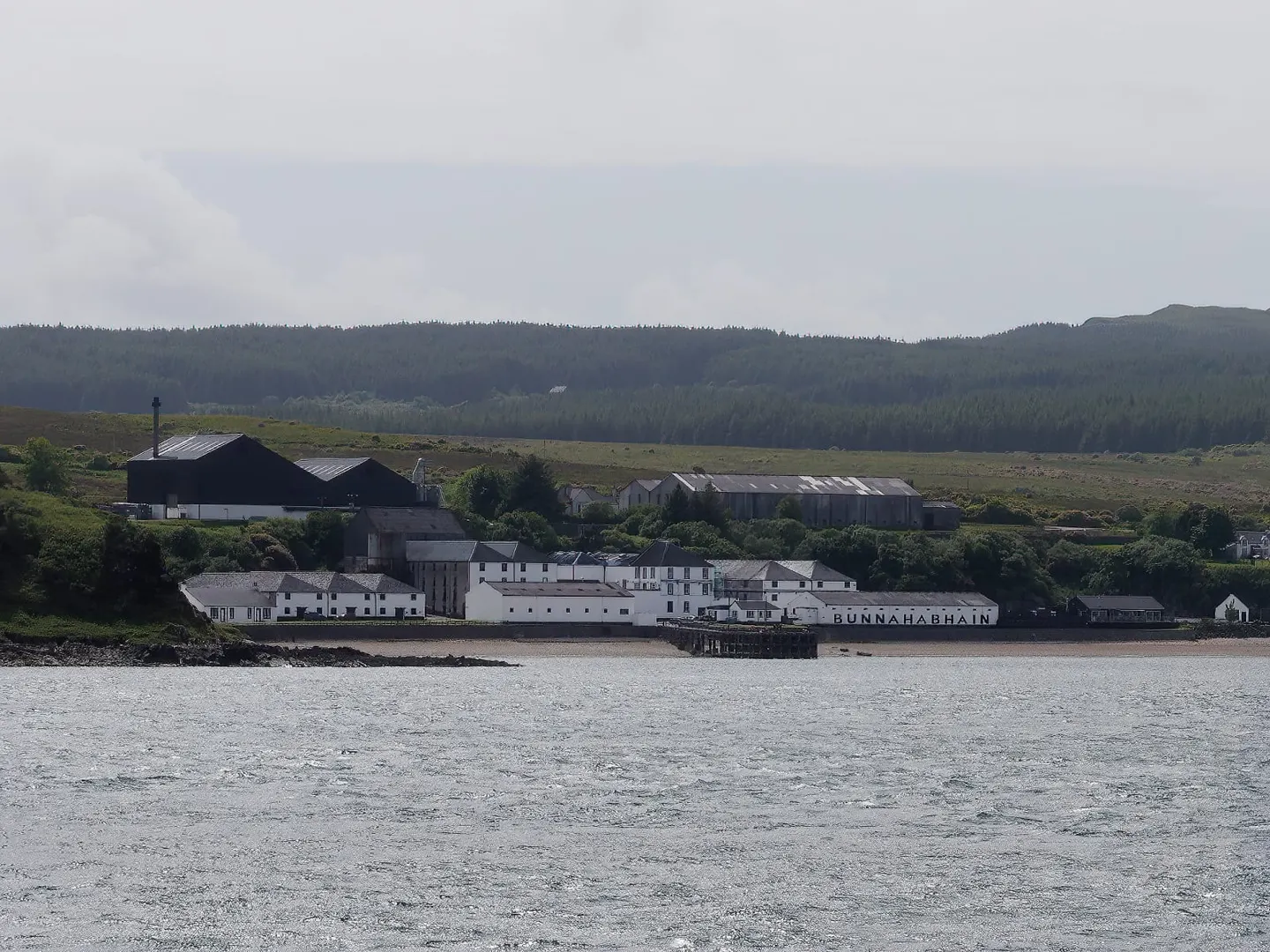 Photo of Bunnahabhain Distillery, a distillery near Port Askaig, Argyll and Bute, the Scottish Highlands and Islands.