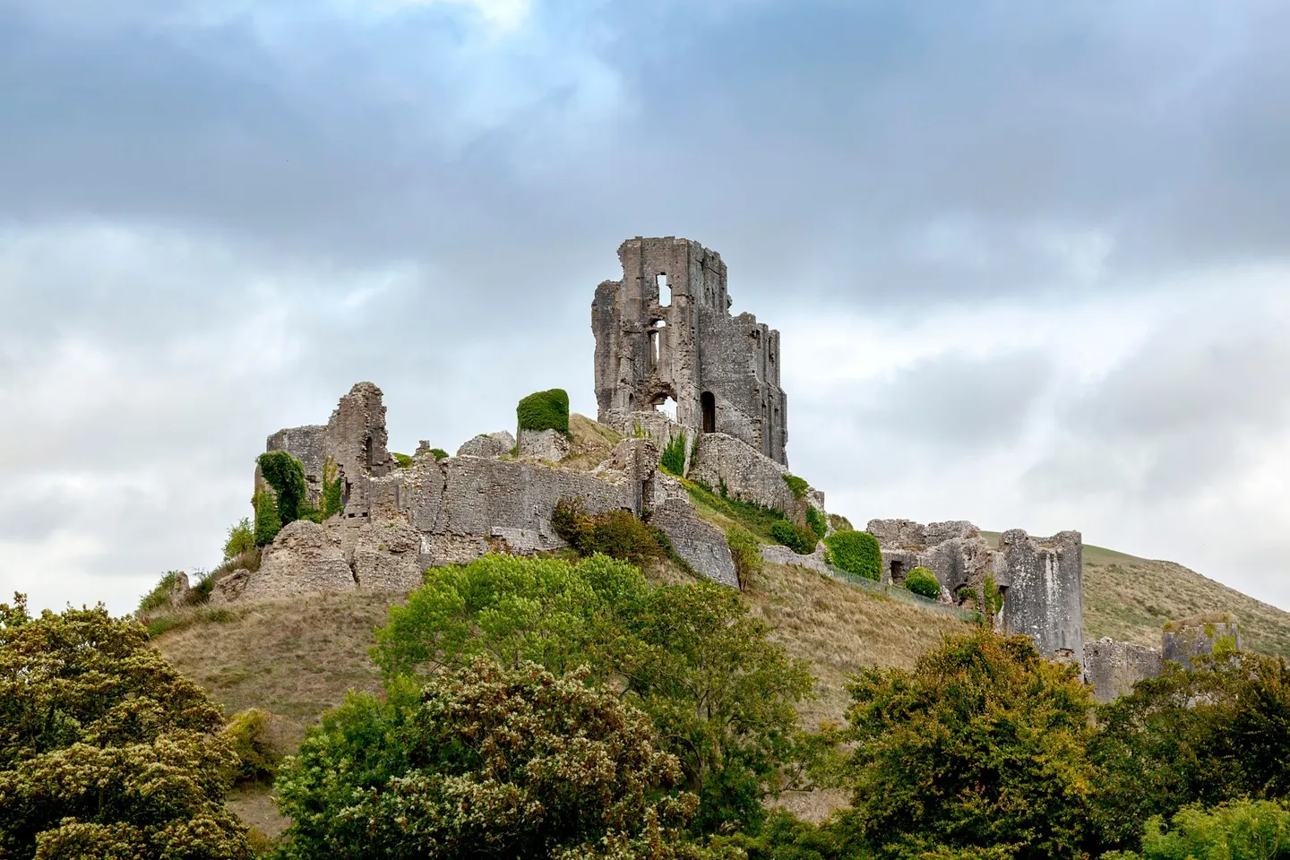 Photo of Corfe Castle, a ruined castle near Kingston, Dorset, south west England.