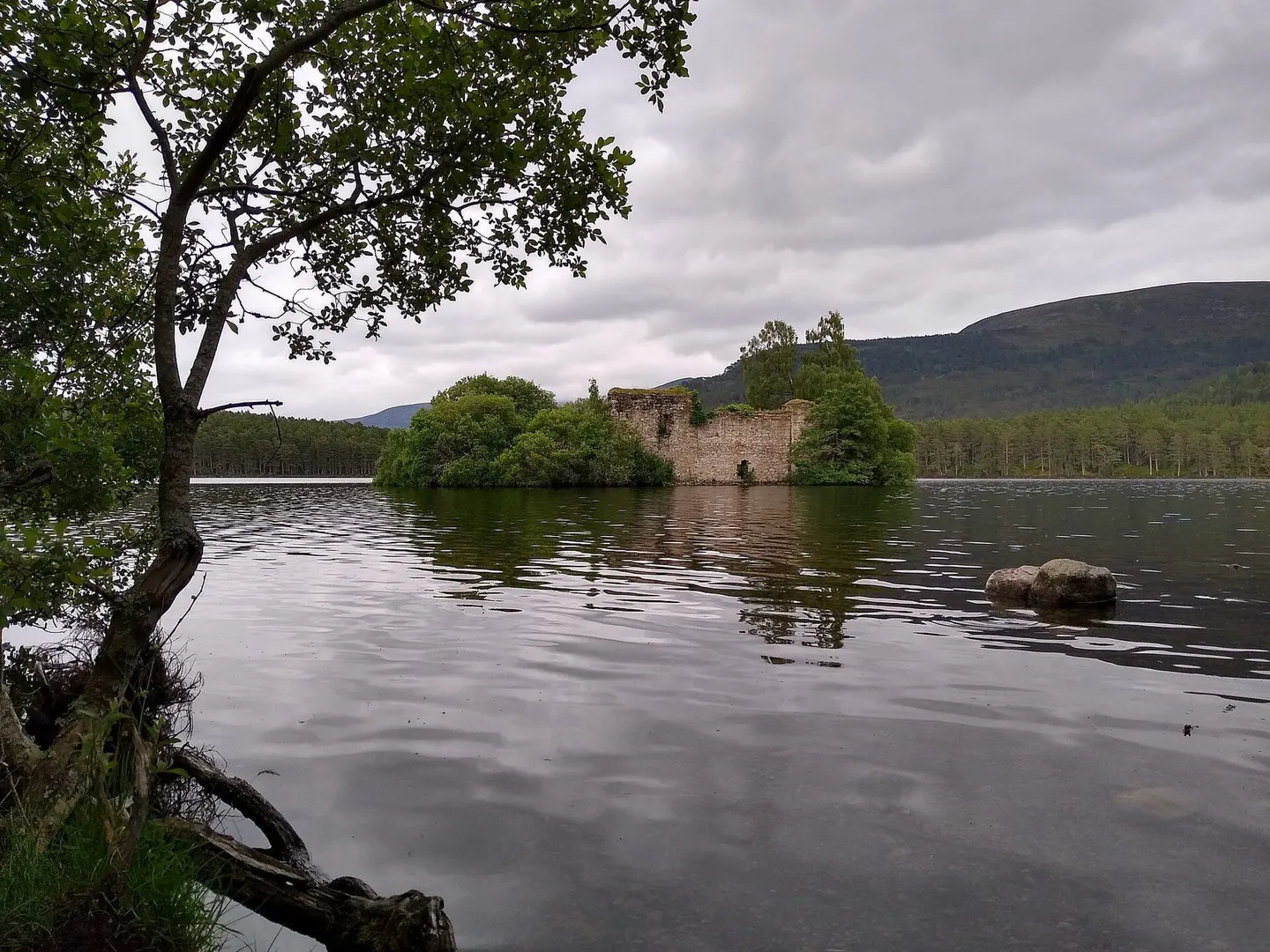 Photo of Loch an Eilein, a loch near Aviemore in the Cairngorms, Highland, the Scottish Highlands and Islands.