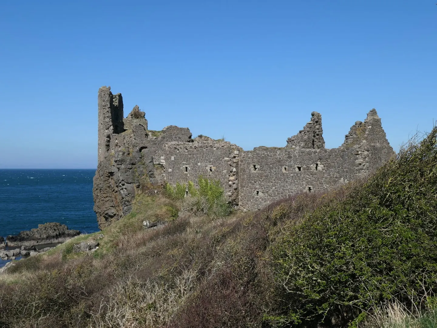 Photo of Dunure Castle, a ruined castle in South Ayrshire, southern Scotland.