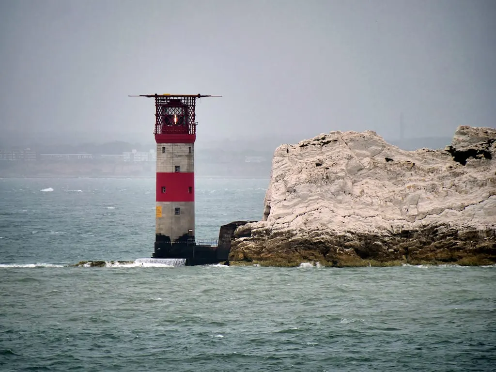 Photo of Needles Lighthouse, a lighthouse near Milford on Sea, the Isle of Wight, south east England.