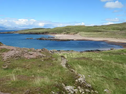 Photo of Kilmory Bay, a beach near Kinloch in the Small Isles, Highland, the Scottish Highlands and Islands.