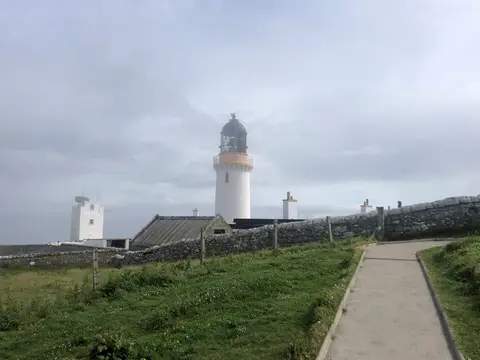 Photo of Dunnet Head Lighthouse, a lighthouse in Highland, the Scottish Highlands and Islands.