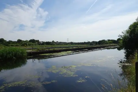 Photo of the Exeter Ship Canal, a canal running from Exeter Basin to Turf Lock, south west England.