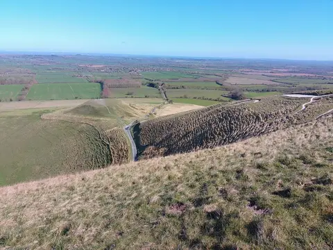 Photo of Dragon Hill, a landmark near Uffington in the North Wessex Downs, Oxfordshire, south east England.