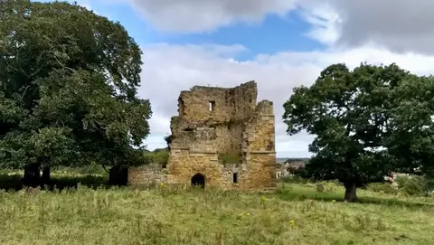 Photo of Ayton Castle, a ruined castle near Scarborough in the North York Moors, North Yorkshire, northern England.
