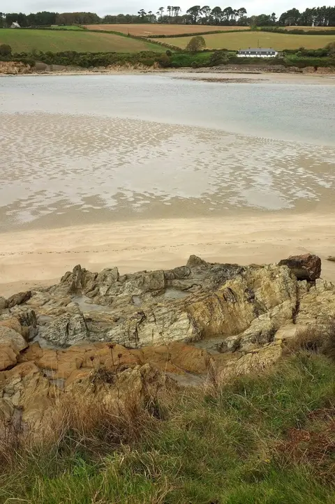 Photo of Coastguards Beach, Erme Estuary, a swimming spot near Bigbury-on-Sea, Devon, south west England.