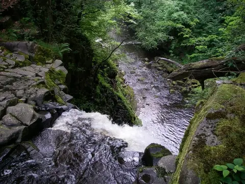Photo of Sgwd Einion Gam, a waterfall near Pontneddfechan in Bannau Brycheiniog, the Powys, mid Wales.
