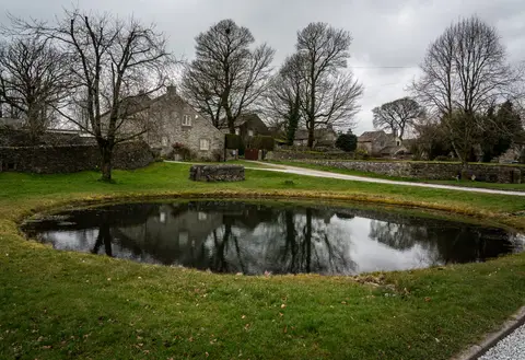 Photo of Foolow, a village in the Peak District, Derbyshire, central England.