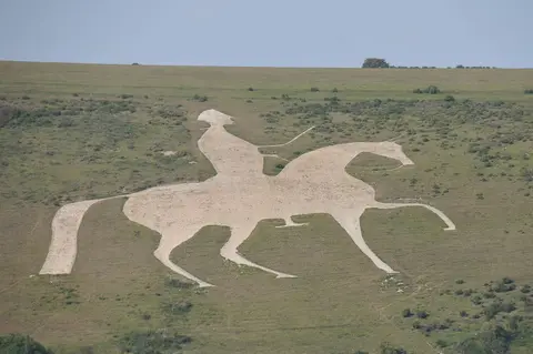Photo of Osmington White Horse, a hill figure in Dorset, south west England.